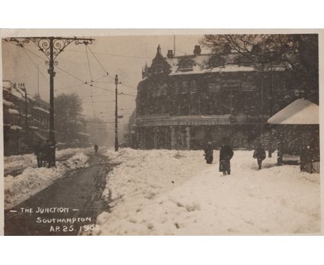 A collection of 41 postcards showing scenes of snowy weather in English towns and villages, including photographic postcards 