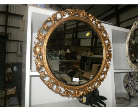 gilt framed circular bevel edged mirror