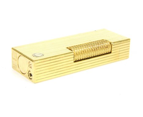 A gold plated Dunhill lighter, with ribbon detailing