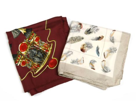 A Hermès silk scarf 'Egypte' designed by Caty Latham , maroon ground with a printed Egyptian design, and another Hermès silk 