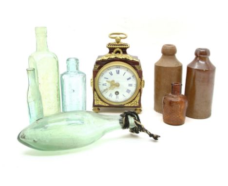 A quantity of collectibles, comprising a brass carriage clock, a French empire style clock, a rosewood tea caddy, a similar b