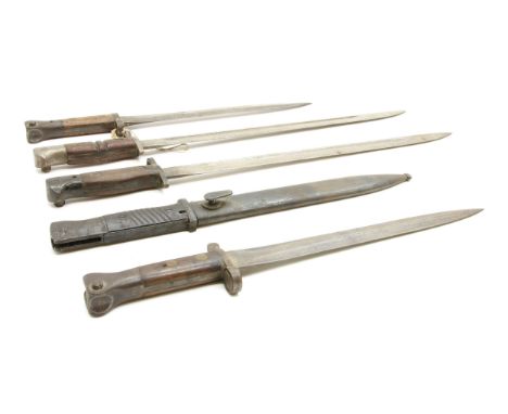 Five assorted bayonets , with various markings to the blades, including a German h/r S.155 bayonet with black blade