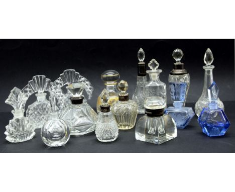 Fourteen various glass scent bottles, five silver mounted, a pair of Art Deco examples and an inkwell