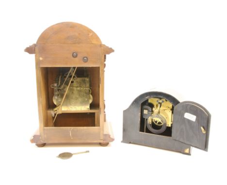 A German oak cased mantel clock by Kienzel, the arched dial with Westminster chime, eight day movement, 50cm high, together w