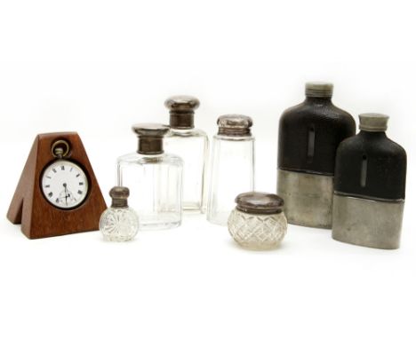 A collection of five silver topped glass dressing table items , together with a collection of button hooks mounted and framed