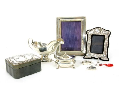 A collection of silver items, to include a jewellery box by Keyford Frames Ltd, two picture frames, a miniature flask and fun