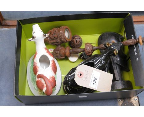 A Victorian treacle glazed cow creamer , a second red and white Staffordshire cow creamer, carved hardwood pipe and a carved 