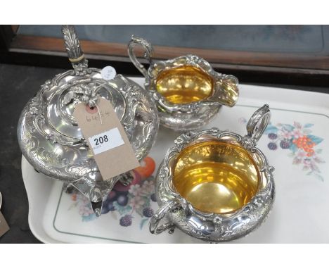 A good quality nineteenth century silver plated three piece tea service comprising tea pot, two handled sugar bowl, milk jug,