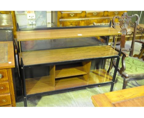 A 1960's Teak and ebonised freestanding shelf unit.