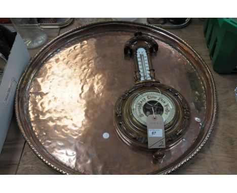 A Victorian walnut wall barometer with an enamelled dial and a large copper circular tray.(2)
