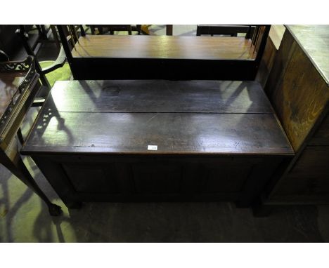 An 18th Century and later oak 3 panel blanket chest raised on stile feet.