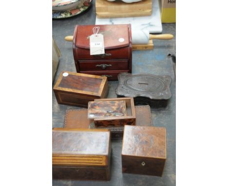 A quantity of 19th century and later tea caddies and boxes to include a maple birdseye veneered caddy lacking fittings, an in