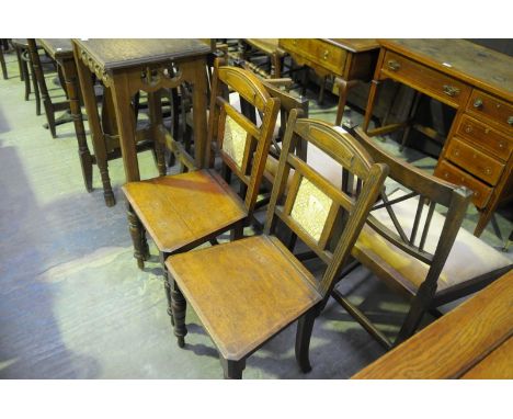 A Pair of Victorian mahogany tile back hall chairs.