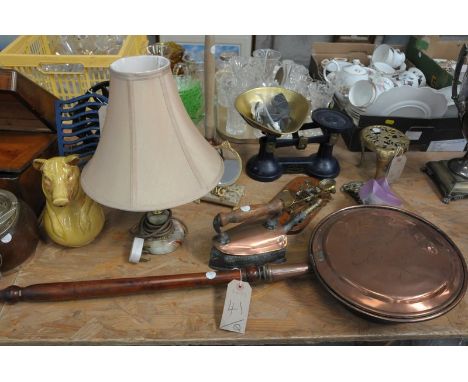 An Oak plate mounted biscuit barrel, iron book stands, brass letter scales, kitchen scales and weights, brass trivet , a coll