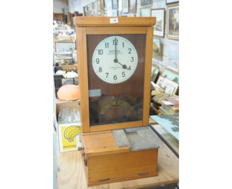 A Pine cased " National Time Recorder Co Ltd " clocking on clock.