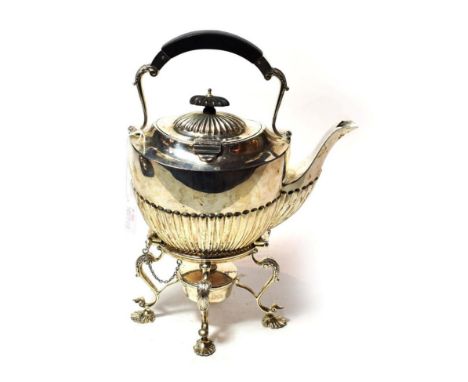 A George V silver kettle, stand and lamp, by Jones and Crompton, Birmingham, 1919, the kettle part-fluted and with overhead p