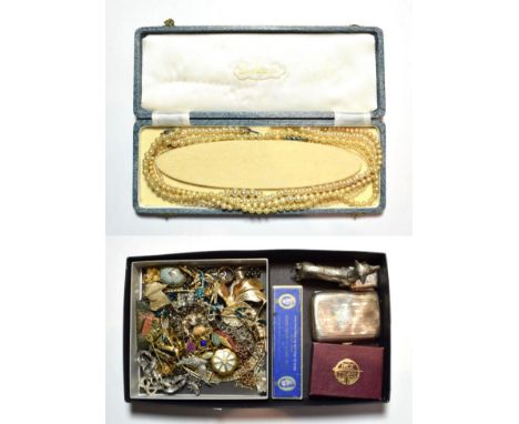 A small quantity of costume jewellery including brooches, pendants, necklaces, a stick pin, a silver cigarette case, a vesta 