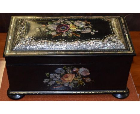 A Victorian papier mache tea caddy 