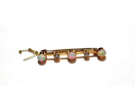 An opal and diamond bar brooch, three oval cabochon opals alternate with two old cut diamonds in yellow collet settings, tota