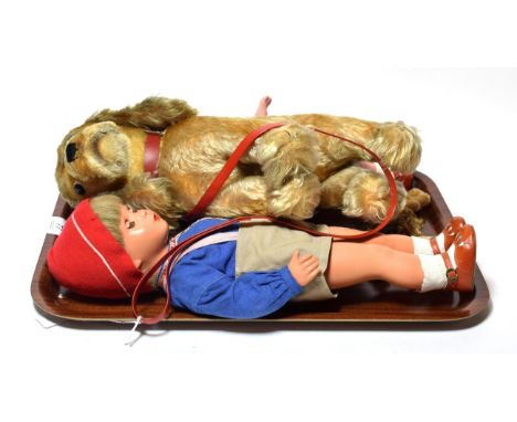 A Steiff plush Cocker Spaniel dog; together with two Schuco style miniature bears; a 19th century bisque miniature doll; and 