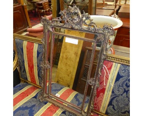A gesso style pier mirror in the rococo manner 