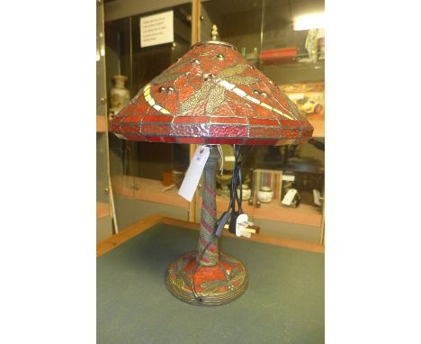 A Tiffany lamp with dragon fly decorated shade 
