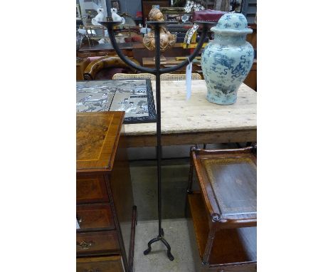 A cast iron three branch pricket stick 