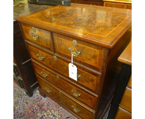 A C20th walnut chest having two short three long drawers on bracket feet W 72 D 46 H 88 cm