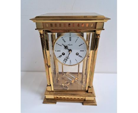 ANGELUS FOUR GLASS REGULATOR MANTLE CLOCKwith a circular enamel dial with Roman numerals and an eight day movement with a mer