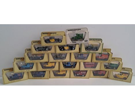 TWENTY MATCHBOX DIE CAST VEHICLESmodels of yesteryear including Harrods van, Captain Morgan rum van, Colman's Mustard van and