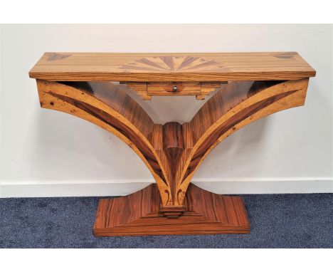ART DECO STYLE CONSOLE TABLEwith a rectangular top inlaid with a fan of specimen walnut above a central drawer with specimen 
