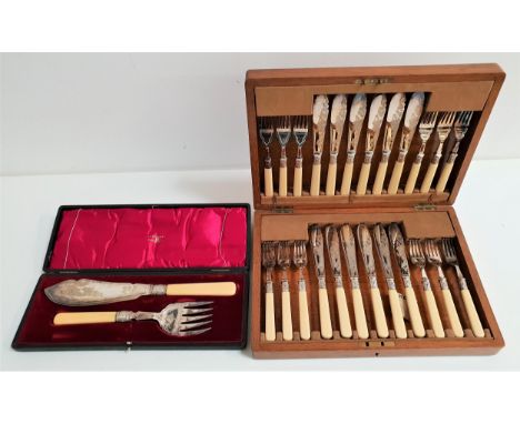 WALKER & HALL SILVER PLATED FISH SERVERScomprising a knife and fork with ivorine handles, in a fitted case, together with an 