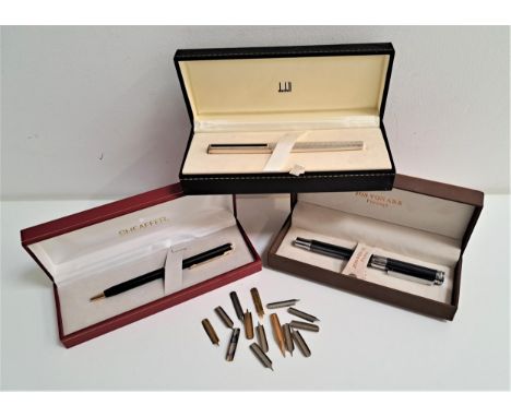 THREE BOXED PENScomprising a Dunhill silver plated fountain pen with fourteen carat gold nib; a Jos Van Arx rollerball pen; a