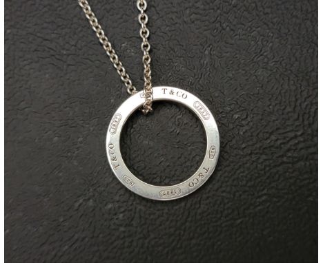 TIFFANY & CO 1837 SILVER OPEN CIRCLE PENDANT NECKLACEon a Tiffany & Co. silver chain 
