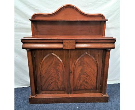 VICTORIAN MAHOGANY CHIFFONIER the shaped raised back with a shelf with turned supports, the base with a cushion frieze drawer