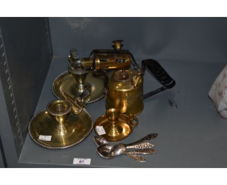 A vintage brass Blaydon blow torch, sold along with a brass chamber stick, two plated chamber sticks with snuffers and a set 