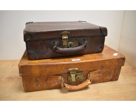 A vintage vellum / leather suitcase having brass fixtures, cloth interior and initials for Colin C. G. Sharp, w43cm, sold tog