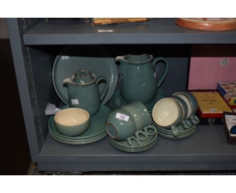 A group of Denby stoneware green glazed coffee wares, to include six cups, six saucers, six side plates, coffee pot, milk jug