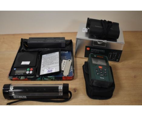 A group lot of equipment comprising of a Leica Rangemaster CRF 900/1200 testing and measuring kit, may require new batteries,