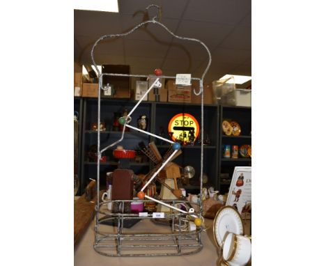 A vintage swimming pool hanger, h85cm , sold together with a retro atomic style coat hanger, L50cm, ( 2 ).