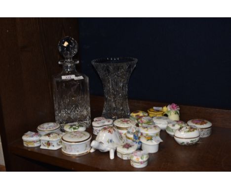 A selection of twenty one bone china florally decorated trinket boxes, sold along with a cut crystal decanter and flared cut 