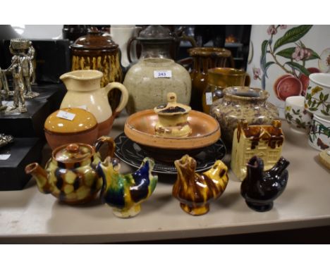 A varied selection of studio pottery items including three vintage pottery bird whistles and various vases and pots etc.