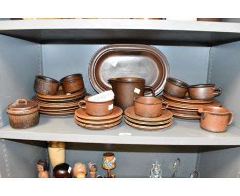 An attractive Finish 'Arabia' pattern part ceramic dinner service, decorated in brown stone glaze, makers mark to base, ( 25 