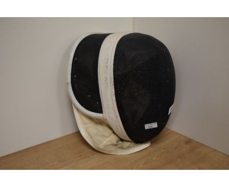 A vintage Leon Paul fencing mask.