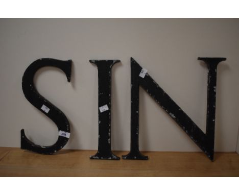 Three large vintage letters N,I and S.