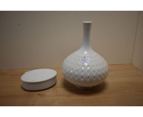 A 20th century Meissen onion shaped vase, having textured dot pattern on a white glaze ground, h26cm, sold together with an o