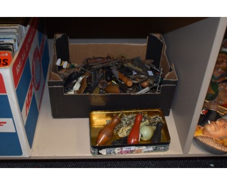 A box of vintage toilet pulls, sold together with various bottle openers, iron keys, brass bells ect