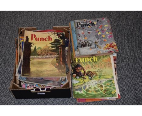 An assortment of vintage magazines and comics including titles of Punch 'Summer Special', 'Richard Gordon- My Finest Hour' an