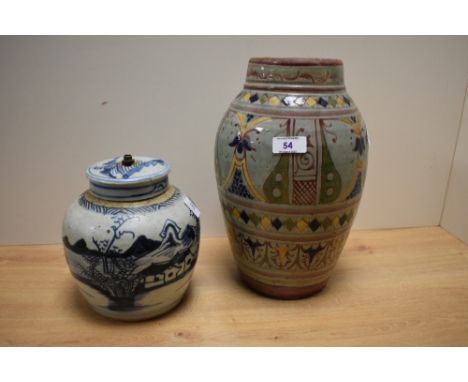 A Moroccan Safi pottery vase, decorated bands of repeating designs, 29cm sold together with a Chinese blue and white pottery 