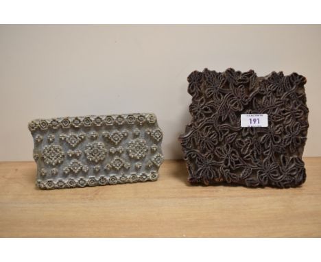 A vintage textile wood printing block having foliage motif patterns and handle, w17cm, sold together with another textile woo